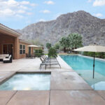 Residential Swimming Pool with Umbrella and Chairs